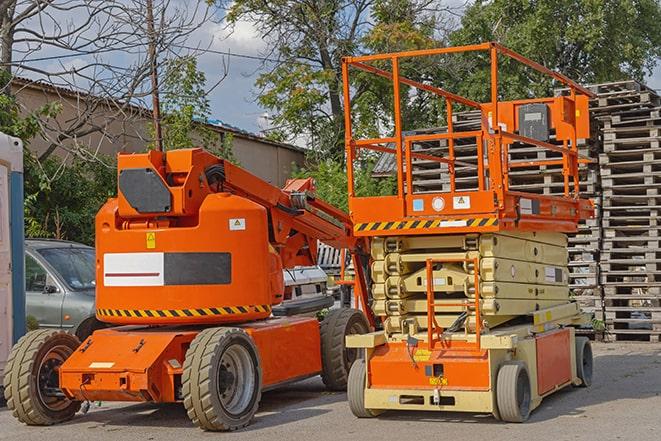 worker operating forklift in bustling warehouse environment in Bonny Doon